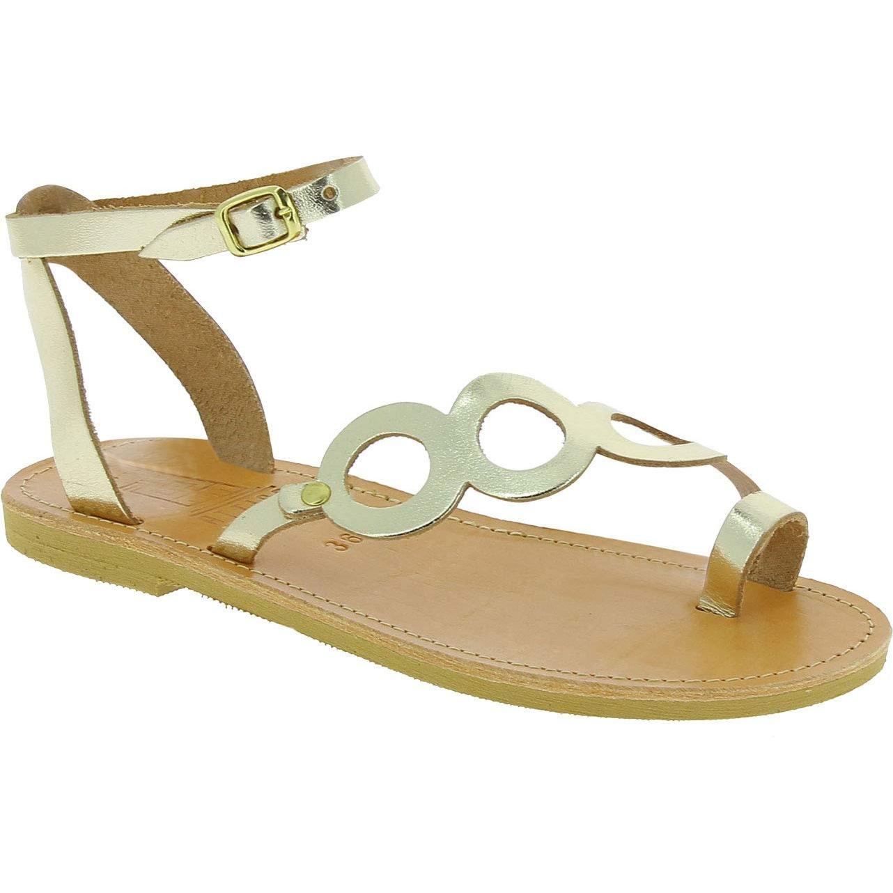 Women's thong sandals with circles handmade in gold laminated calfskin